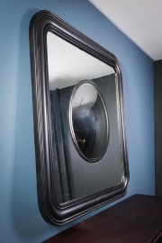 Round Convex Mirror in a Square One