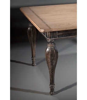 The superb Montgolfière table in solid oak with its top and its superb feet carved in solid oak.