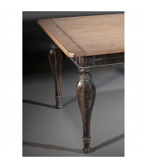 The superb Montgolfière table in solid oak with its top and its superb feet carved in solid oak.