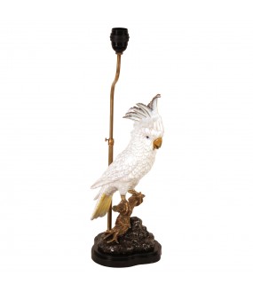 Table lamp with its cute white porcelain cockatoo on a brass branch.