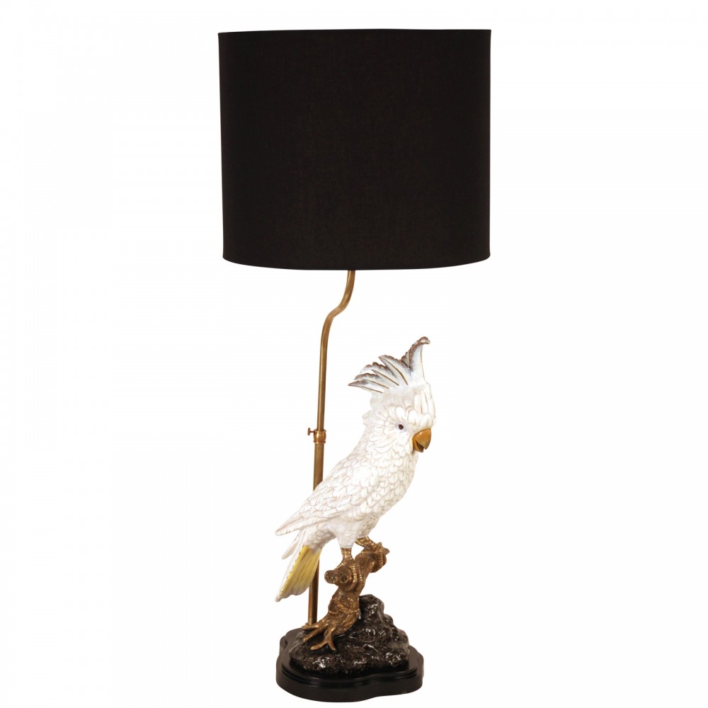 Table lamp with its cute white porcelain cockatoo on a brass branch.