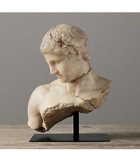Magnificent bust of a discophore reproduces the fragment of an original bronze statue